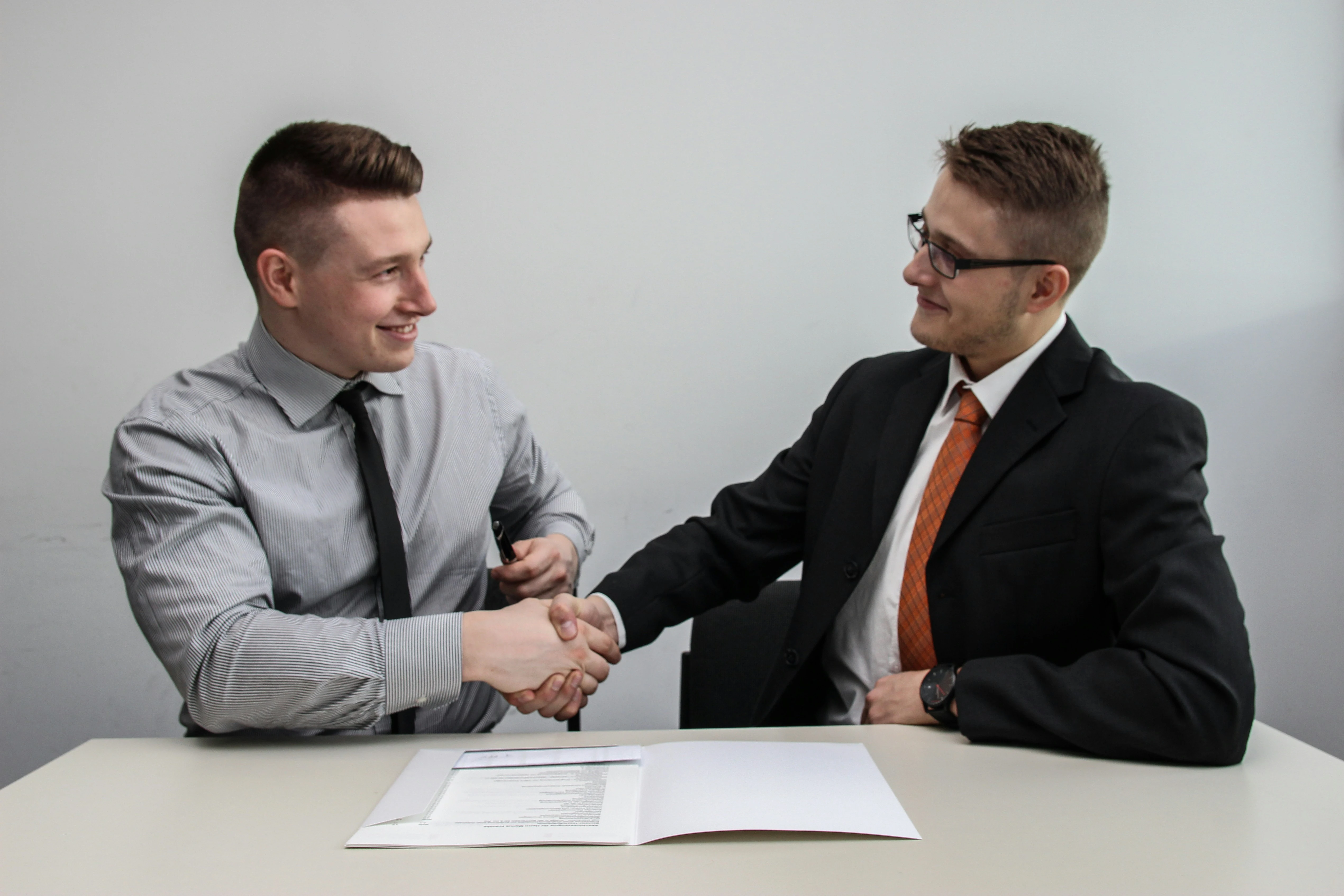 Happy customers at car dealership